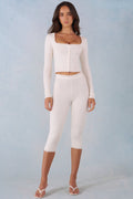 Pantalones Capri de punto de tiro medio en marfil