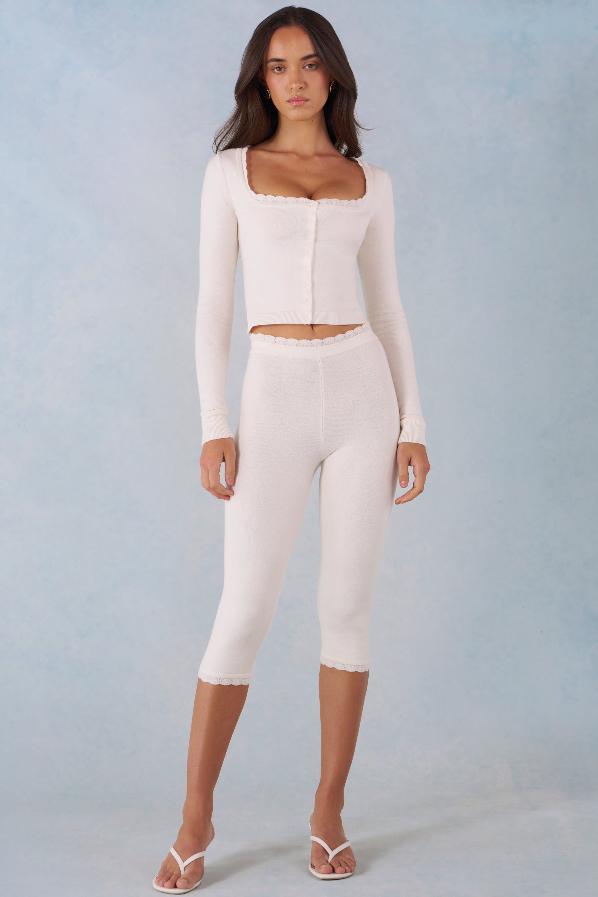Pantalones Capri de punto de tiro medio en marfil