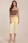 Vaqueros Capri de tiro medio en amarillo limón