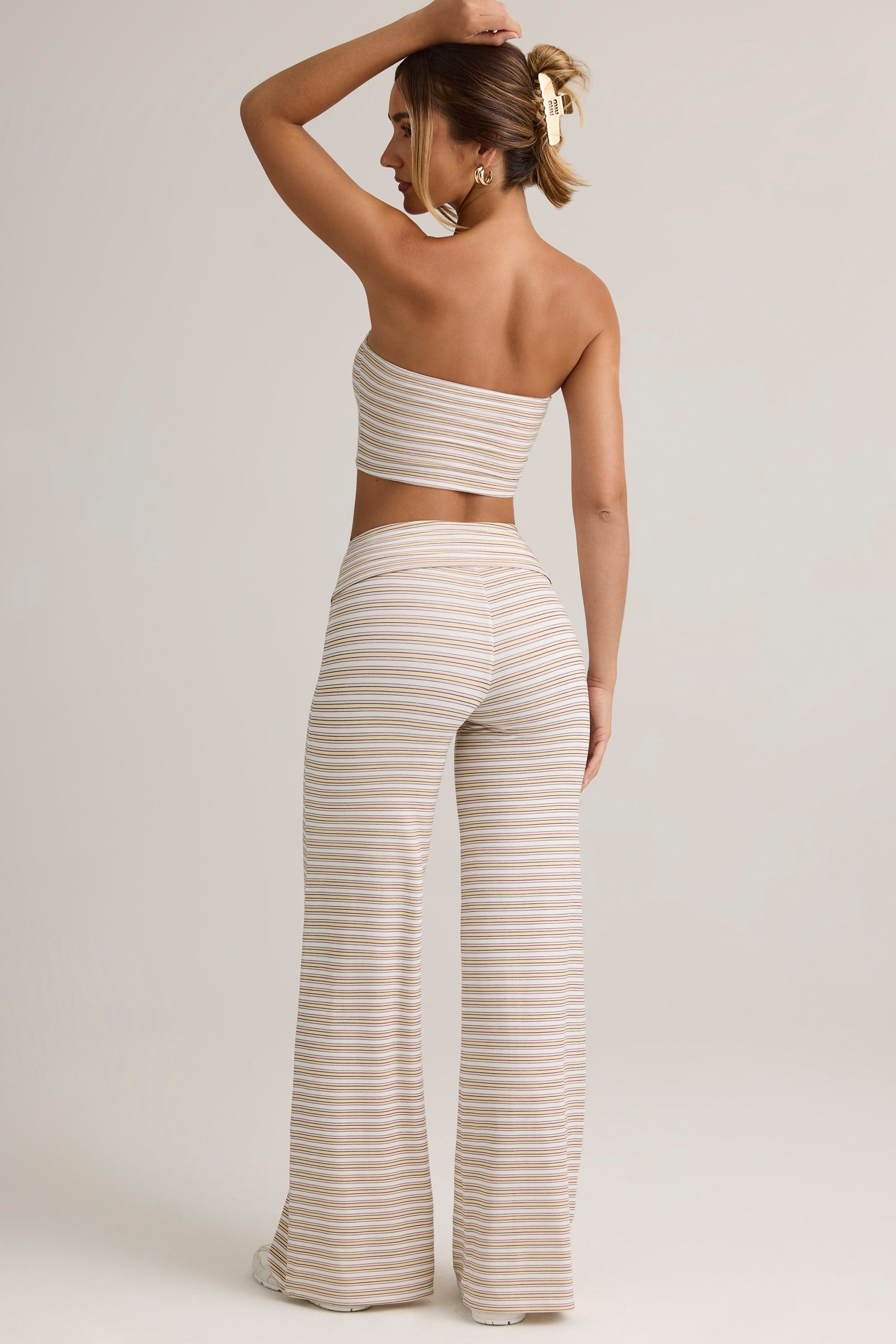 Pantalones de modal de pierna ancha con cintura plegable en rayas rosa y amarillas