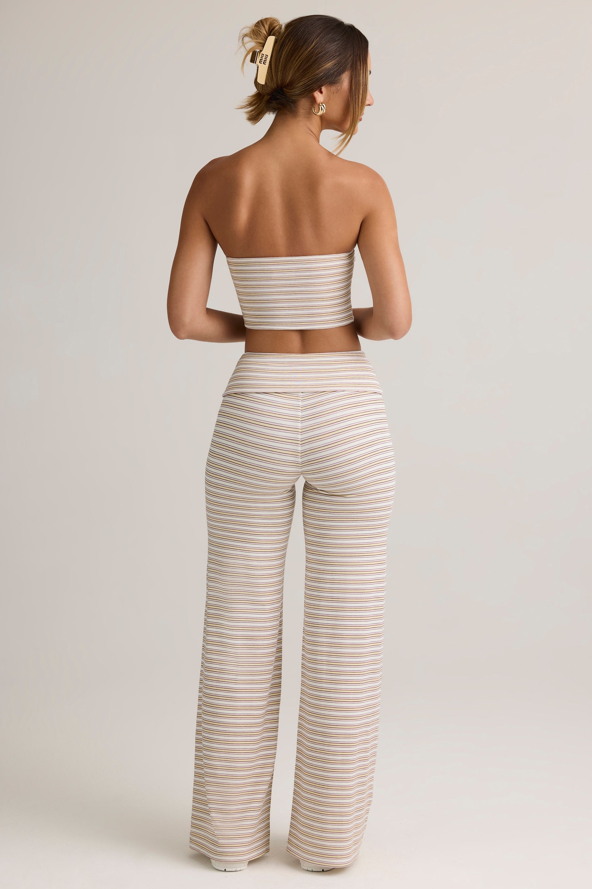 Pantalones de modal de pierna ancha con cintura plegable en rayas rosa y amarillas